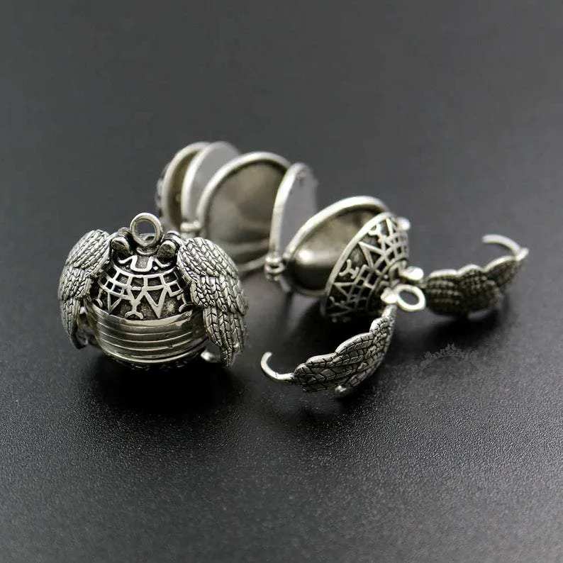 Winged Sphere Expanding Photo Locket