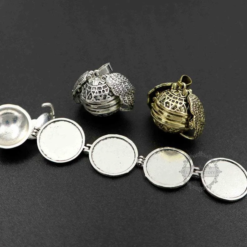 Winged Sphere Expanding Photo Locket